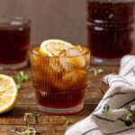 Sweet Tea in glasses, lemon, and a pitcher.