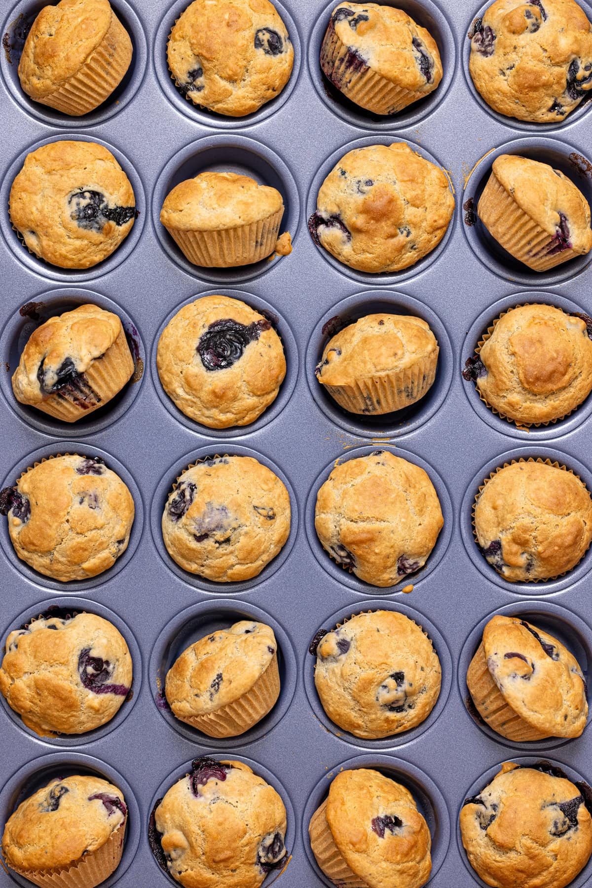 Up close shot of muffins in muffin pan.