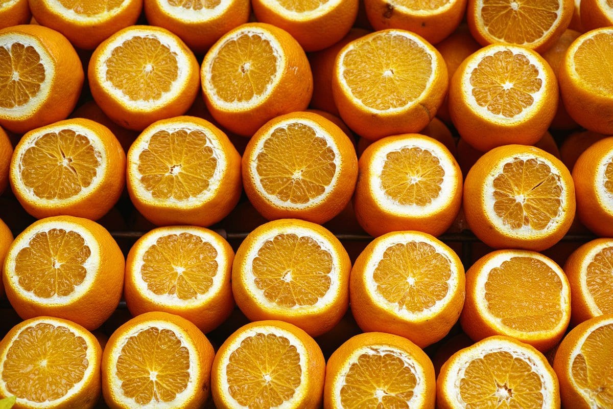 A line up of sliced oranges.