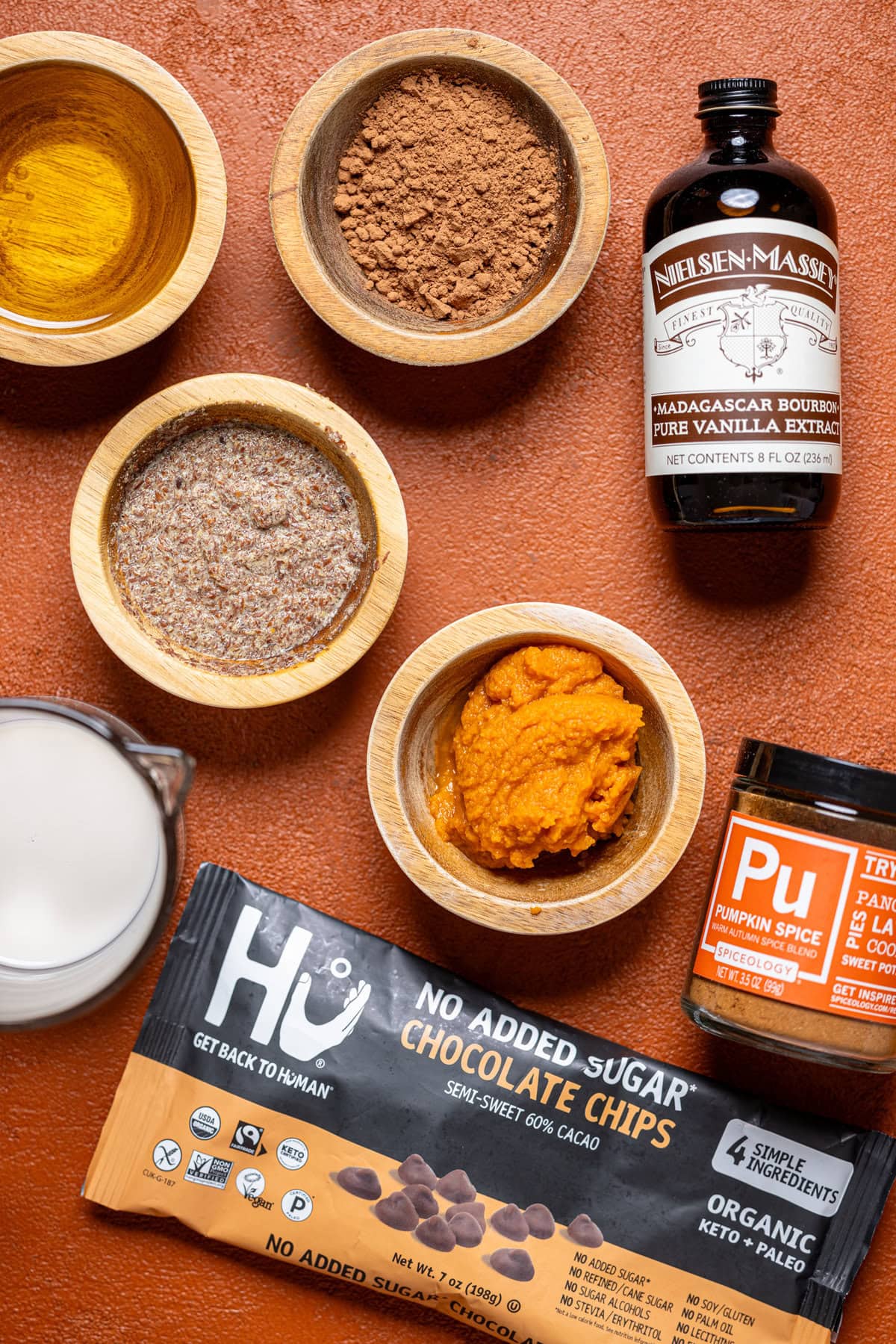 Ingredients on a burnt orange table.