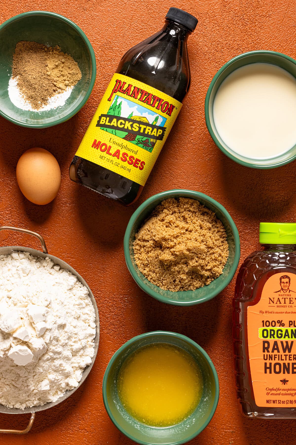 Ingredients on a burnt orange table.