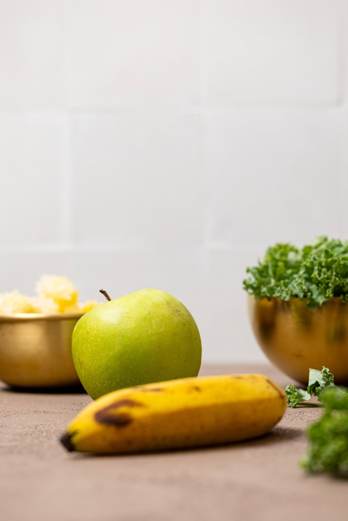 Ingredients on a brown-greyish table.