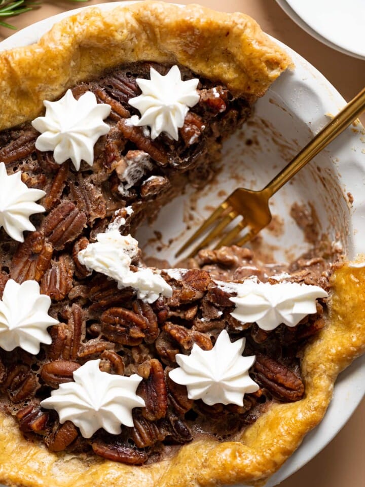 Fork where a slice is missing from a Vegan Southern Bourbon Pecan Pie