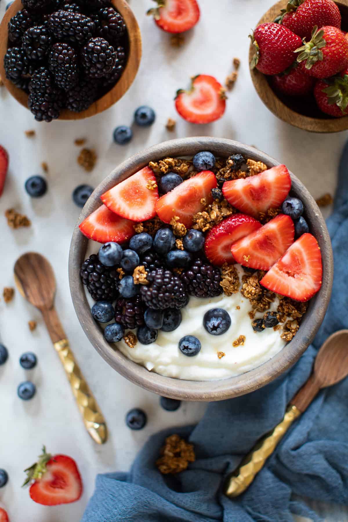 Bowl with berries, granola, and yogurt.