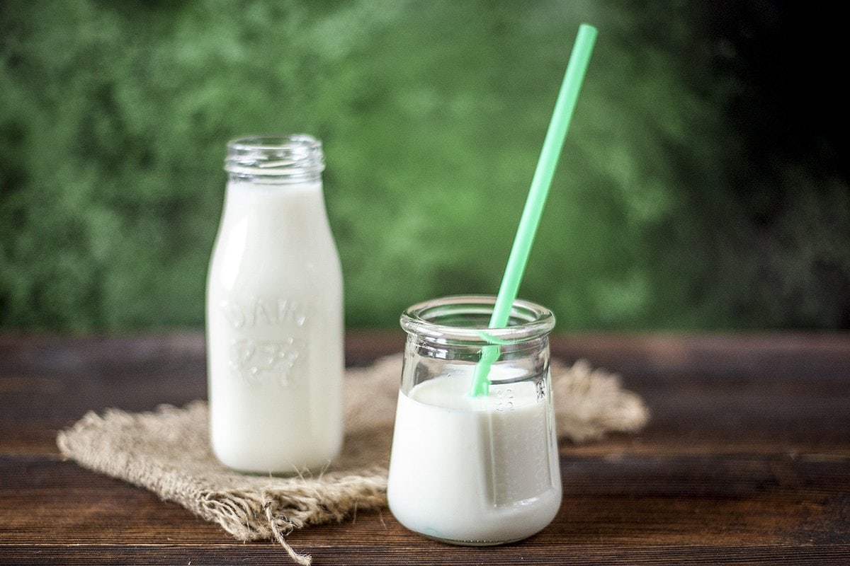 Kefir milk drink on a wooden table.