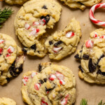 Up close shot of baked cookies with candy canes.