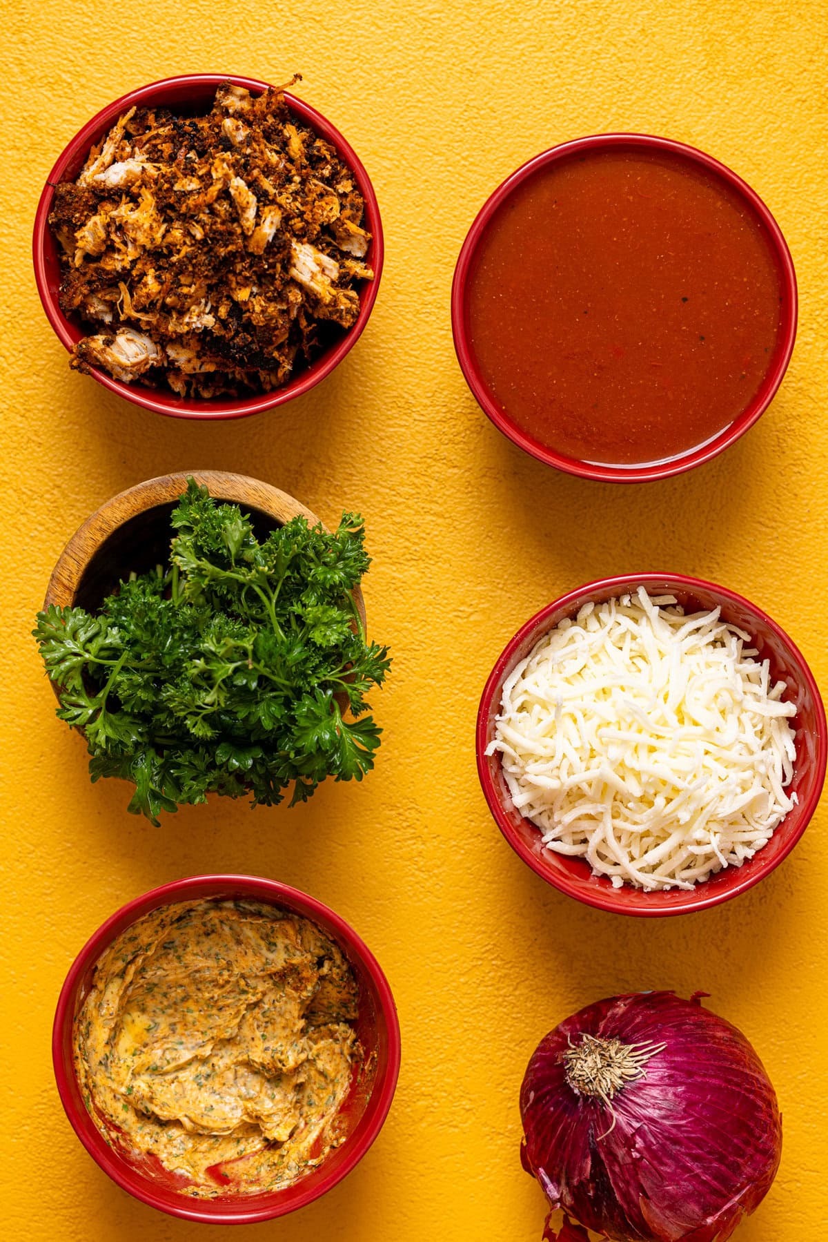 Ingredients on a yellow table.