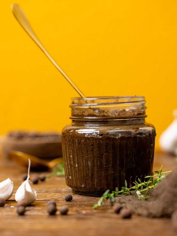 Marinade in a jar with a spoon.