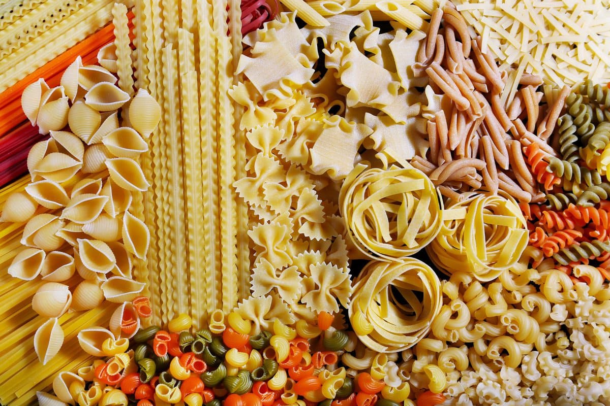 Long and short types of pasta all mixed together.