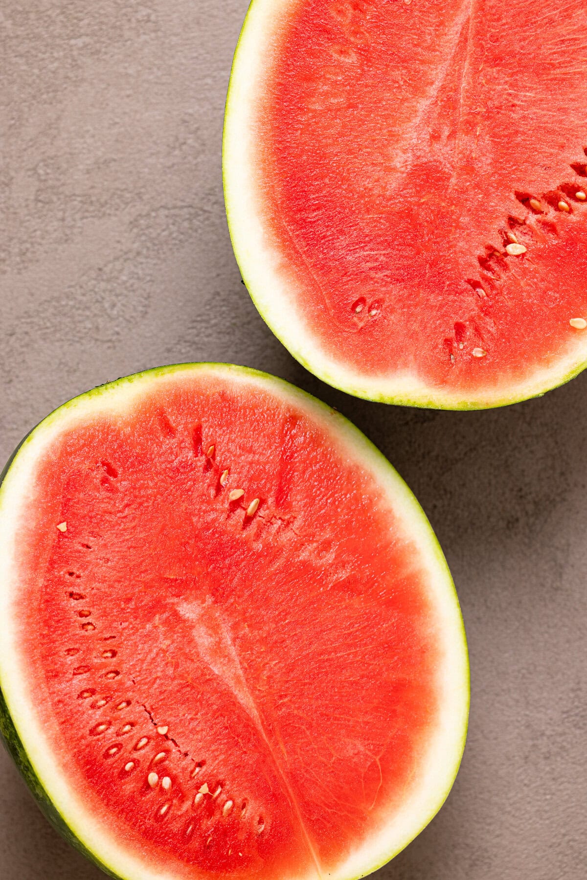 A large watermelon cut in half.