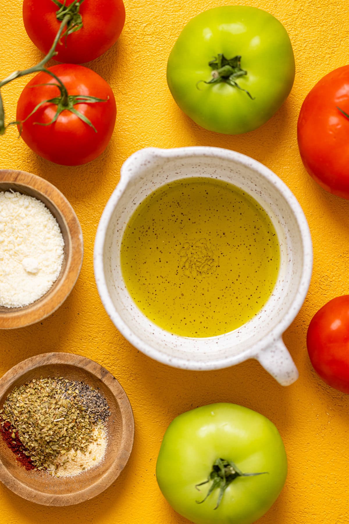 Ingredients on a yellow table.