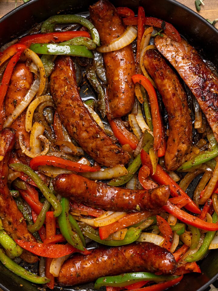 Up close shot of sausage + peppers.