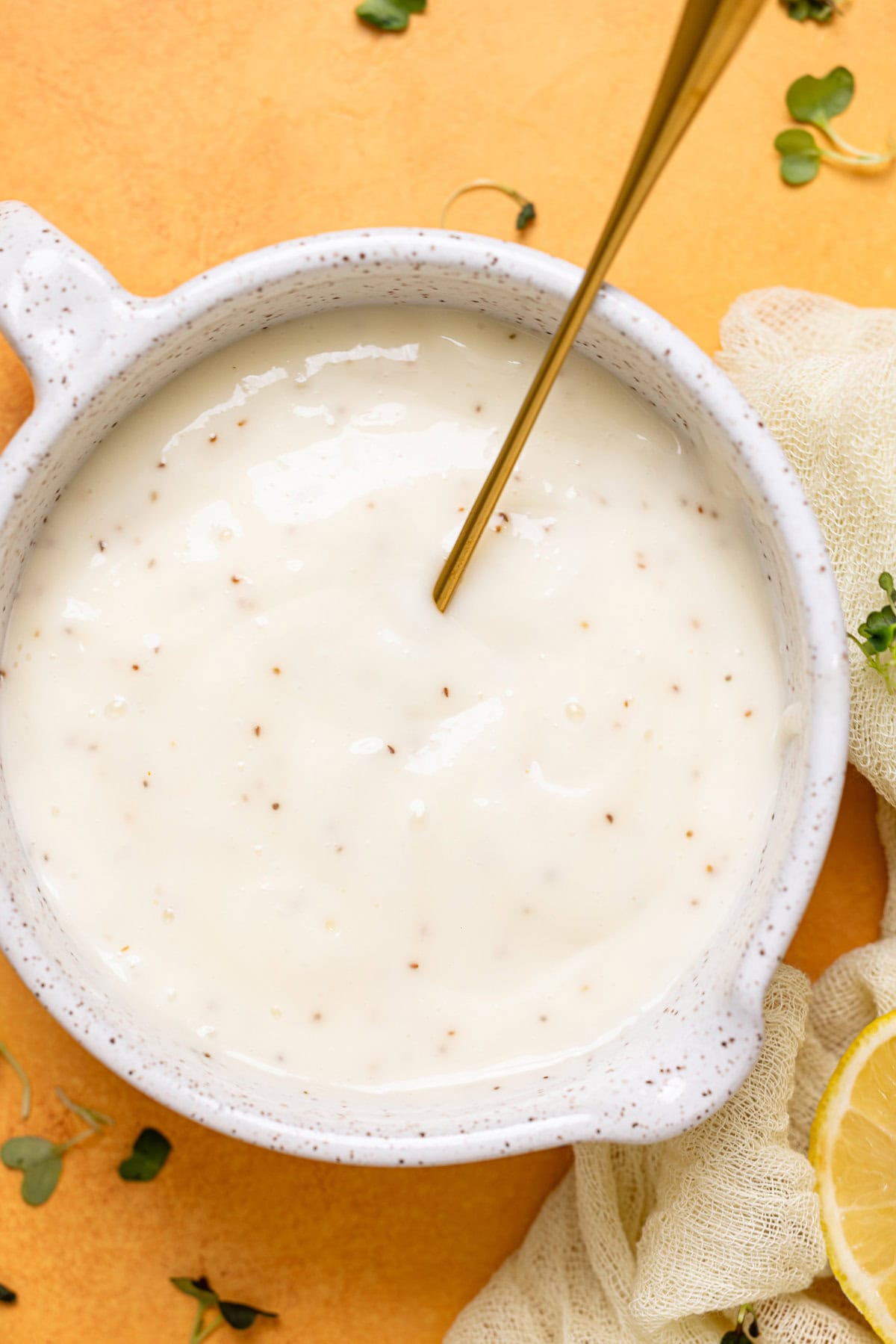 Up close shot of coleslaw dressing.