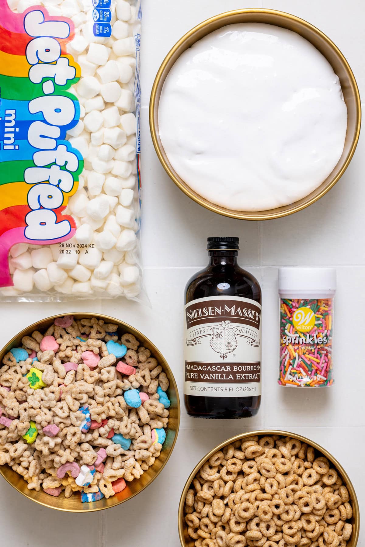 Ingredients on a white tile table.