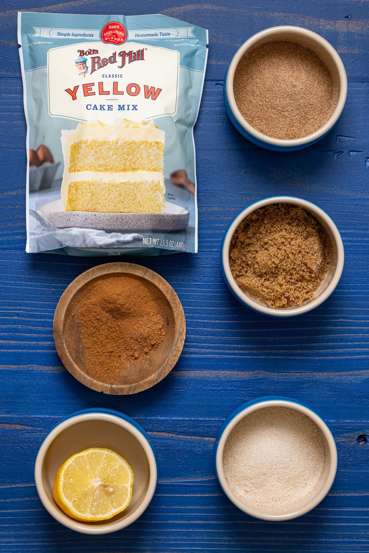 Ingredients on a blue wood table.