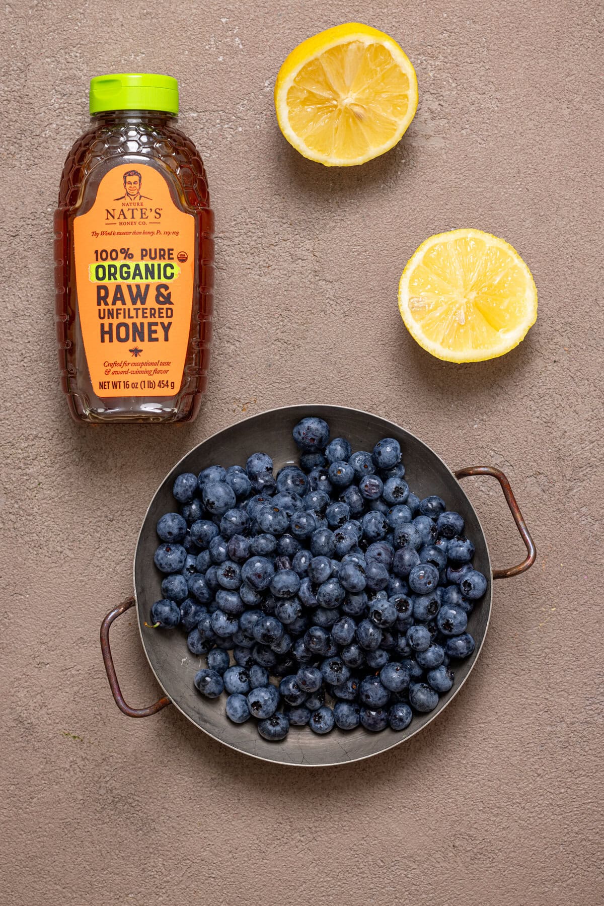 Ingredients on a grey-brownish table.