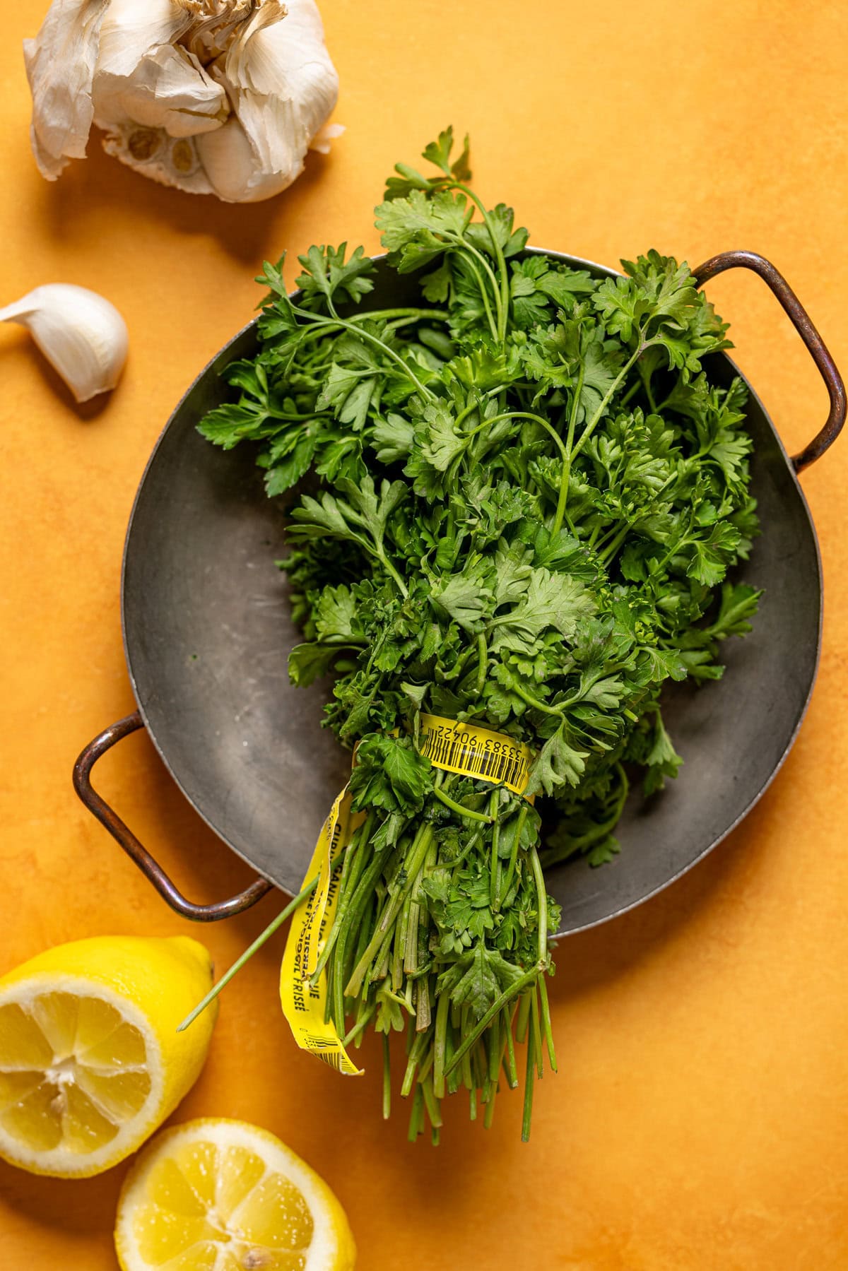 Ingredients on a yellow table.