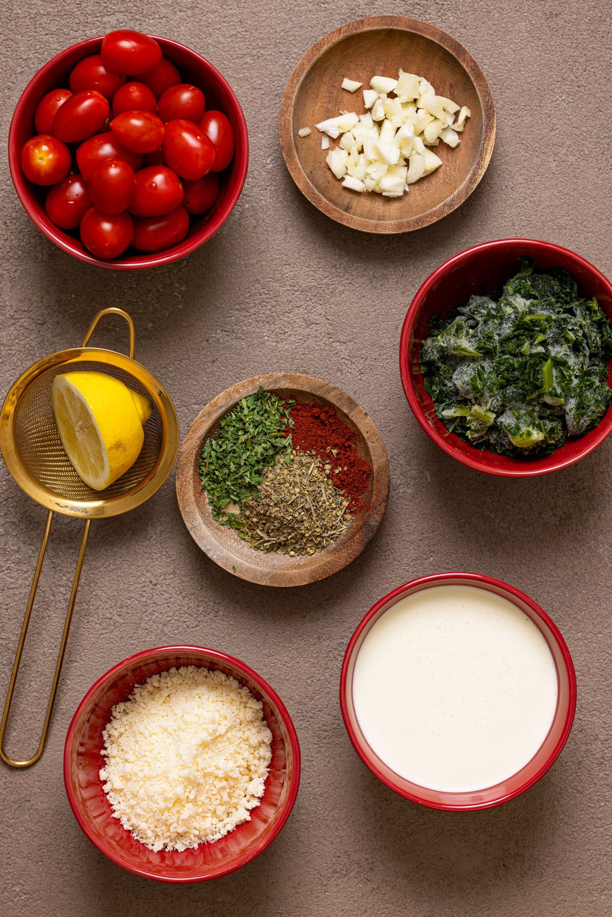 Ingredients on a grey-brownish table.