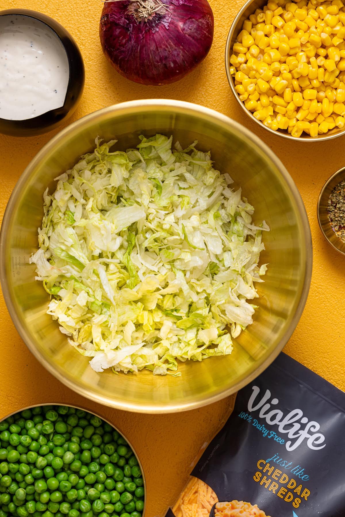 Ingredients on a yellow table.