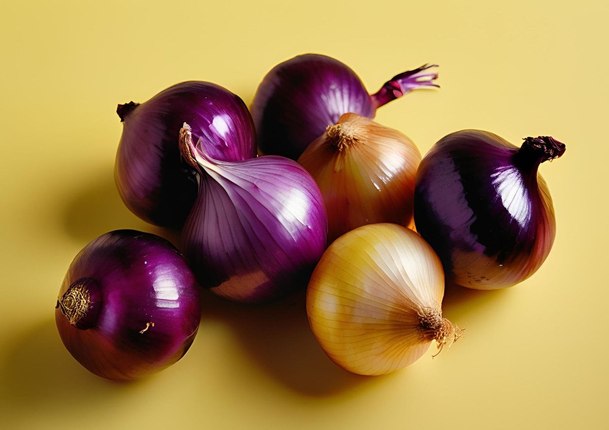 Onions on yellow background