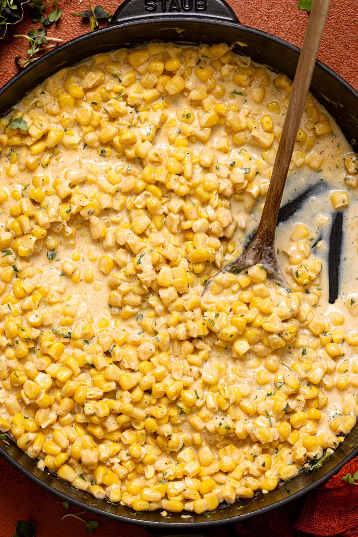 Creamed corn in a skillet.