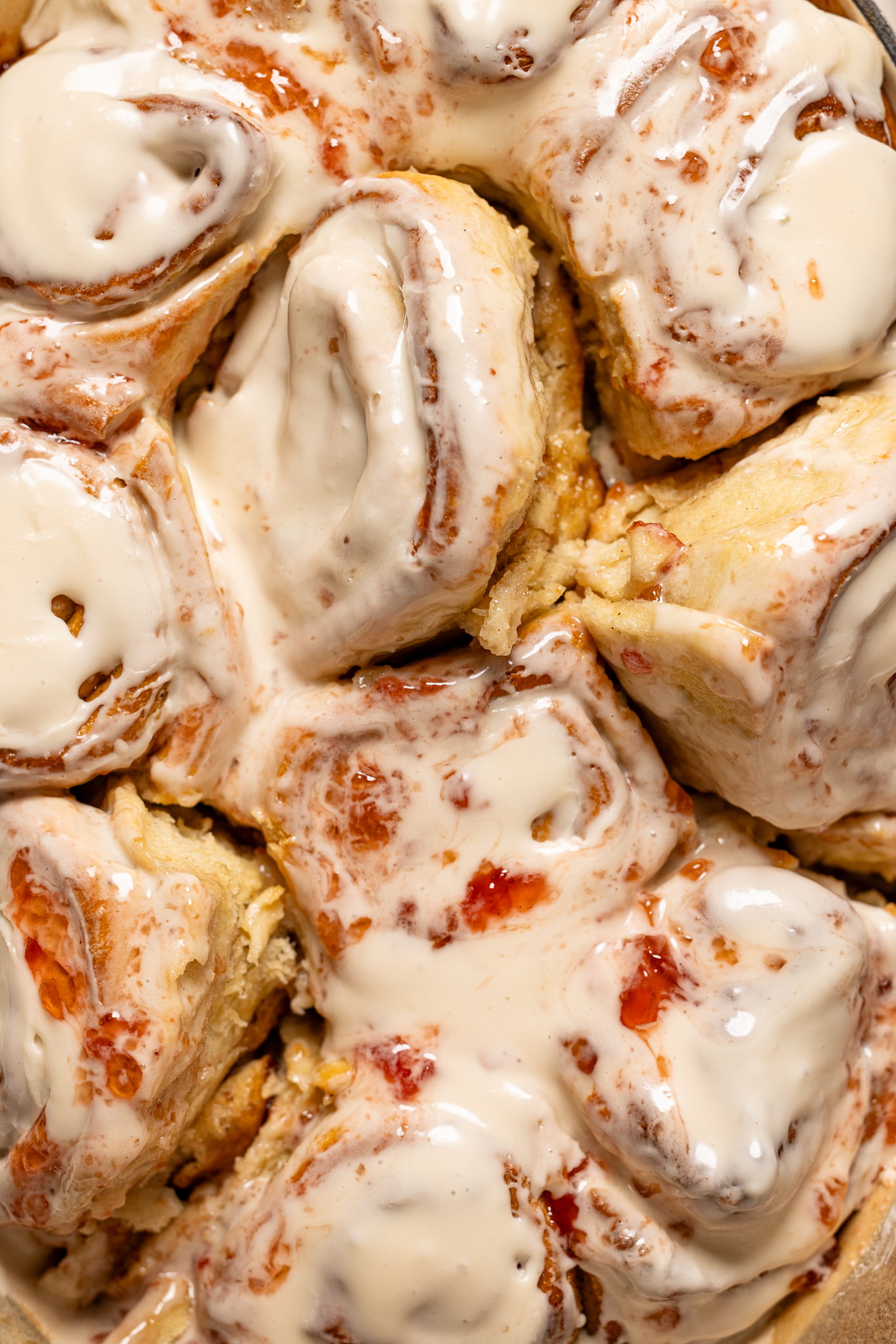 Up close shot of strawberry shortcake cinnamon rolls.